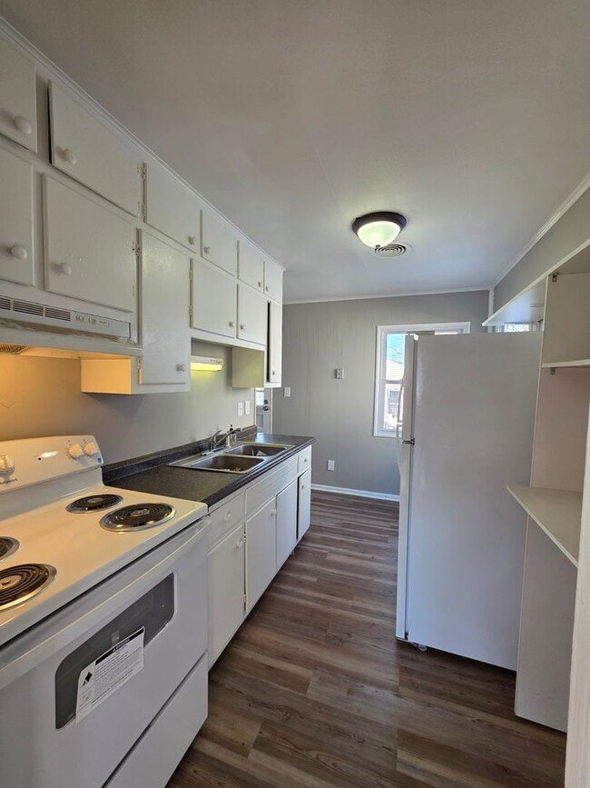 Photo - Charming 3-Bedroom Home – Modern, Clean & Carpet-Free!