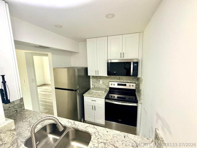 Building Photo - 1766 Abbey Rd Unit 105