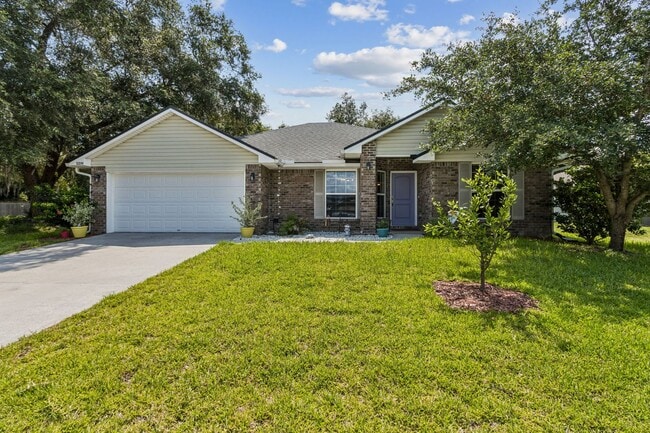 Building Photo - Spacious 4BR Brick Home in Northbrook – Minutes to I-95 & Amelia Island