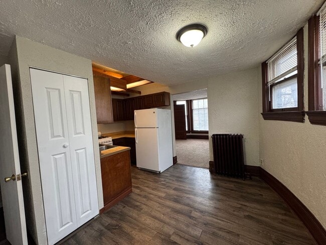 Photo - Racine Cozy 1BR / 1BA Apartment | Off-Street Parking + Appliances +  Walk-In Shower Unit 2 - UPPER #2