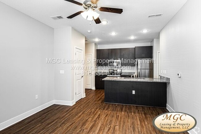 Photo - Ground-Level Comfort Meets Elevated Outdoo...