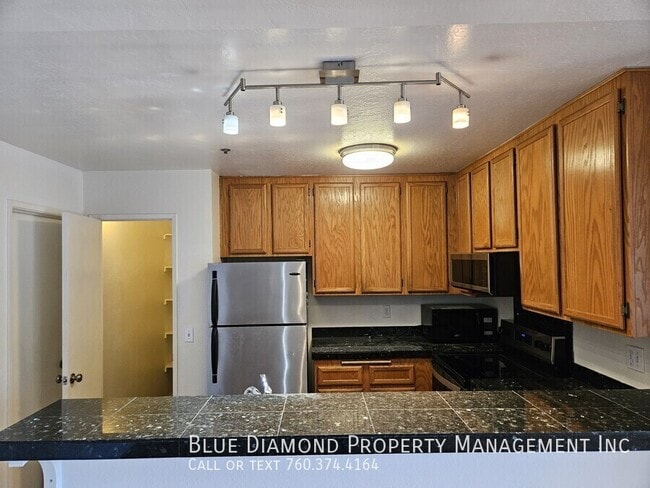 Building Photo - 7757 Caminito Encanto Unit 102
