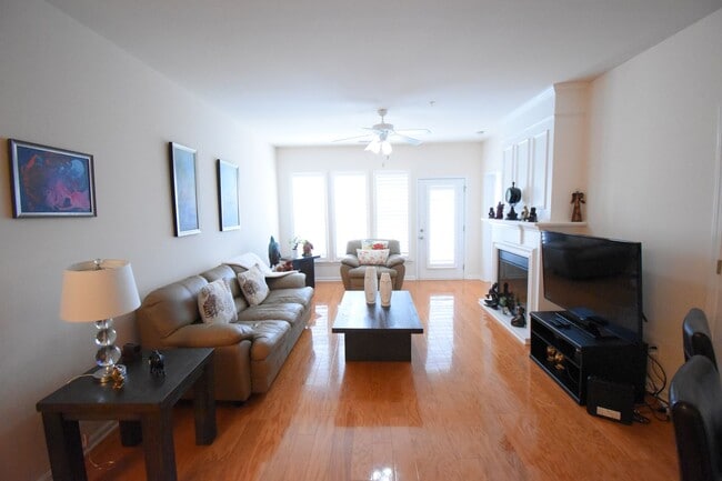 Photo - Beautiful 3BR 2BA Condo • Granite Kitchen • Balcony & Pool • Furnished 4th-Floor End Unit Condo i...