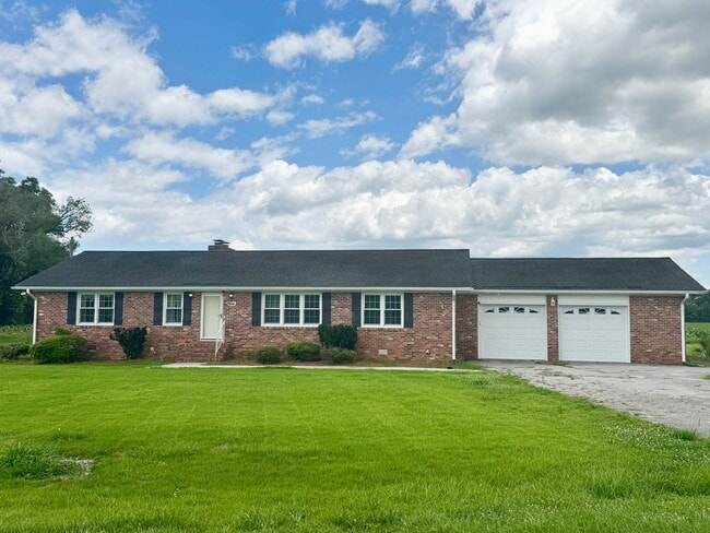 Building Photo - Hard-to-Find Home with Garage & Detached Shed & Modern Updates
