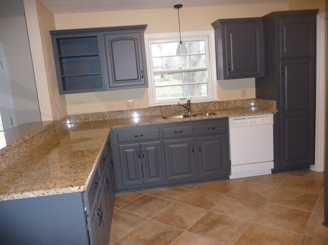 Kitchen includes dishwasher, stove, microwave and refrigerator - 1321 Leeson Way