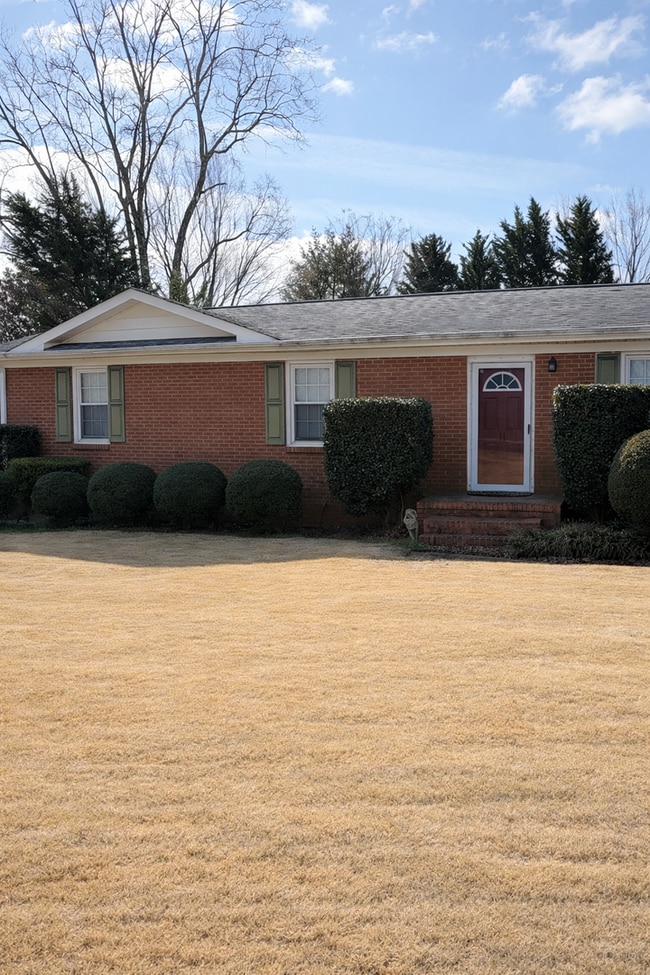 Photo - FENCED IN YARD AND LARGE DETACHED TWO CAR GARAGE LOCATED IN THE DESIRED TRAVELERS REST!!!