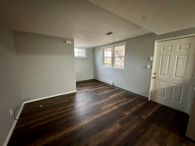 Photo - 1 Bed / 1 Bath • All Utilities Included • Private Entrance Unit Apartment 9