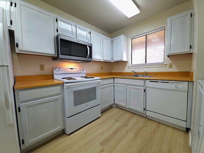 Photo - Get ready to fall in love with comfortable, carefree living at Courtyard Condominiums in Tyler, TX!