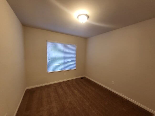 Photo - Spacious 4-Bedroom, 2.5-Bath Home Near Dow...