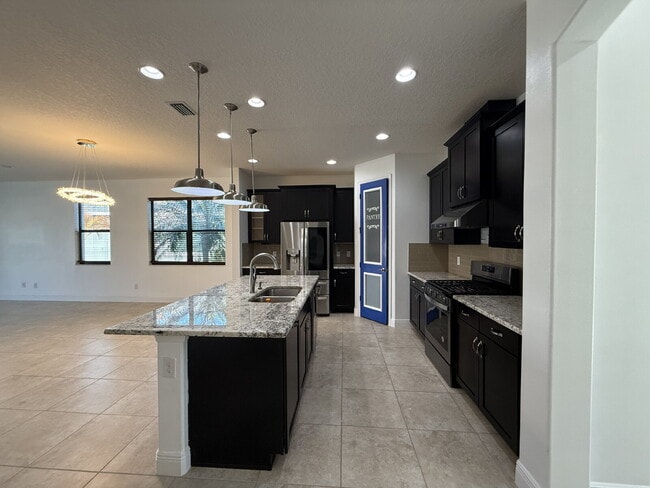 Photo - 4BR, 2.5BA home with resort style outdoor living!