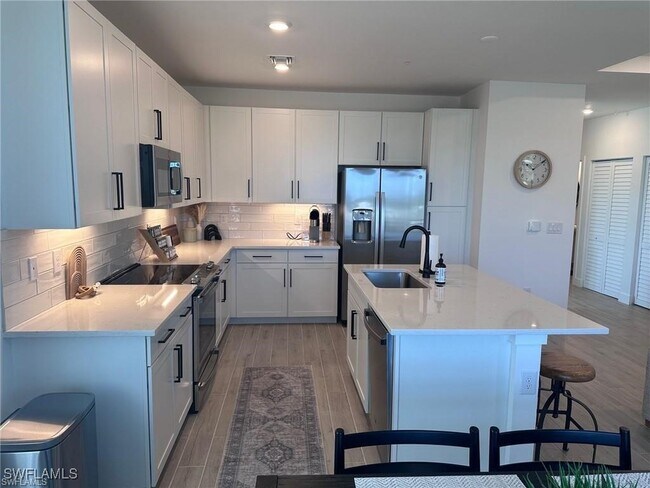 Building Photo - 26430 Coco Cay Cir Unit 203