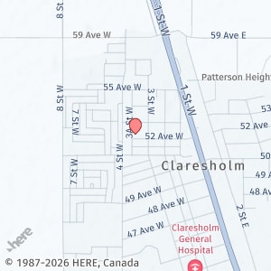 Building Photo - Pet Friendly Townhouse In Claresholm Close To Amenities