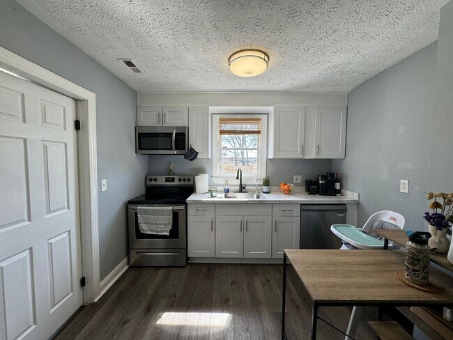 Photo - Welcome to this charming Cape Cod style ho...