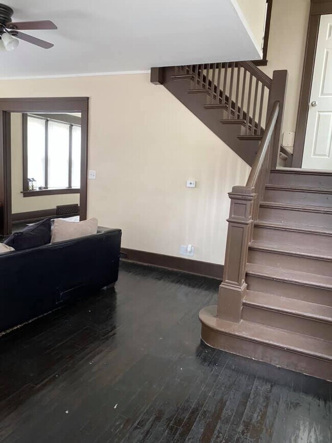 Staircase across from entry door - 908 N Harrison St