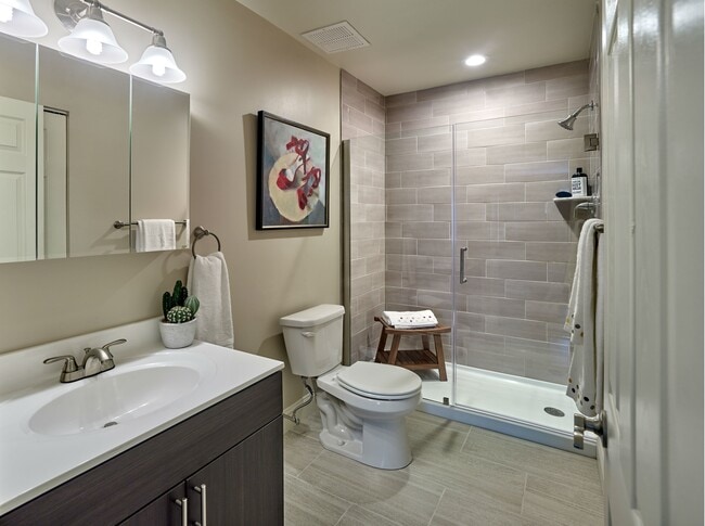 Willowyck Apartments bathroom with walk-in shower
