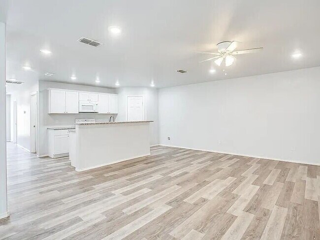 Photo - Spacious 3-Bedroom Duplex with Open Living Areas! Unit A