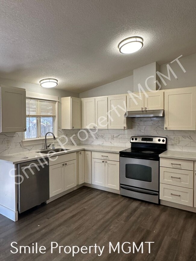 Photo - A charming three-bedroom & two-bathroom house.