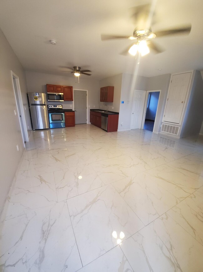 Living Area/Kitchen - 744 E Atlanta Ave House Unit 2