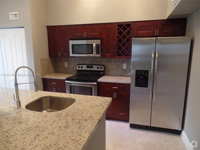 Building Photo - 2810 N Oakland Forest Dr Unit 305 Rental