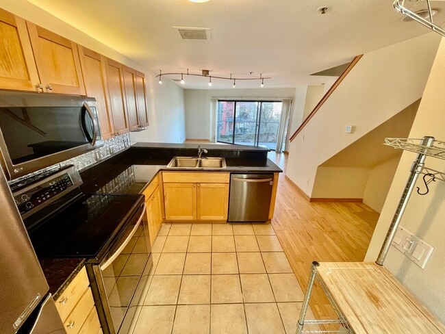 Photo - Top-Floor Riverfront Living with Broadway Bridge Views | 2 Bed + 2 Bath + Parking