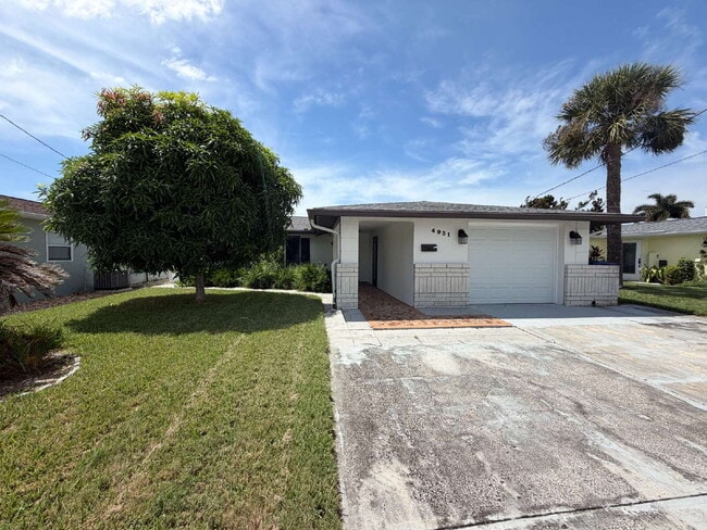 Photo - "Charming 2-Bed, 2-Bath Retreat in New Port Richey - Cozy Living at 4931A Pompano Drive!"