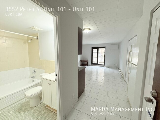 Photo - COZY MAIN FLOOR BACH NEAR U OF W - INCLUSIVE! Unit 101