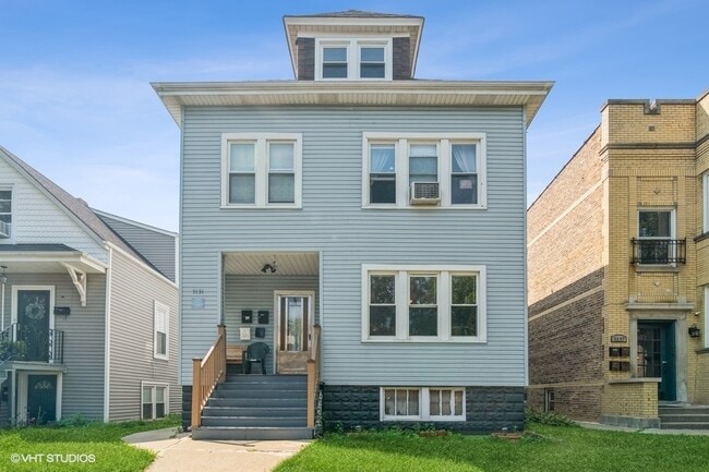 Building Photo - 5131 W Henderson St Unit 1