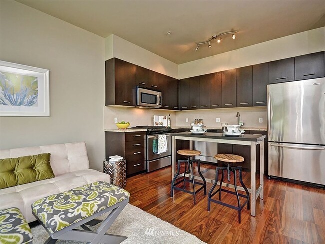 Building Photo - Avail Now: Corner Unit 305