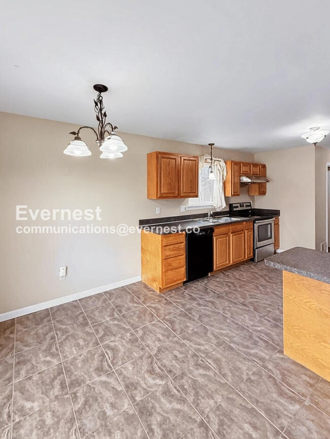 Photo - Spacious 3 Bed, 2.5 Bath Home with Fenced Yard and Attached Garage