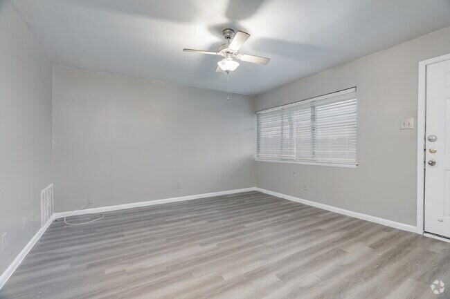 2BR, 1BA - 880SF - Living Room - Landmark Apartments