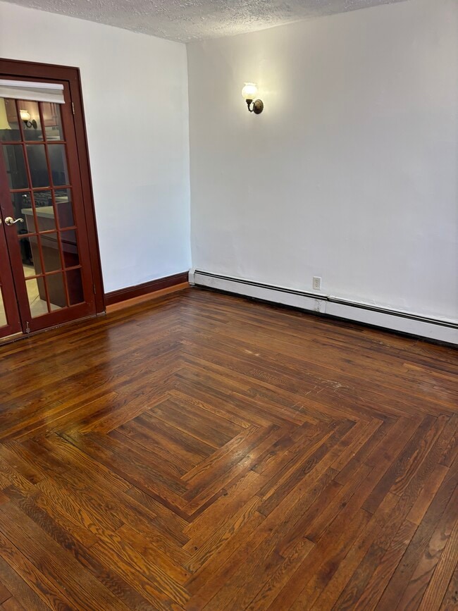 Photo - 153 Grand St Unit Apartment with Backyard