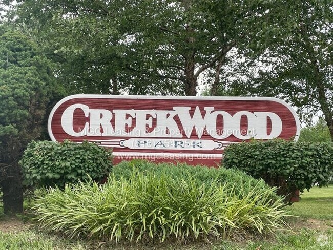 Building Photo - Creekwood Park Townhomes - At Last, This I...