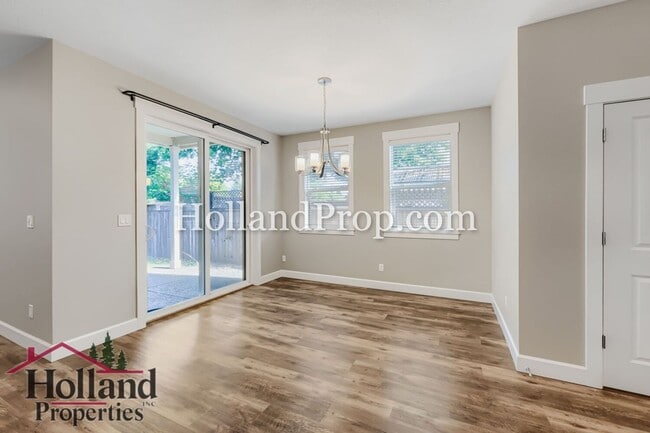 Photo - Beautiful 3-Bedroom Home with Fireplace, Modern Kitchen & Private Backyard in Hillsboro