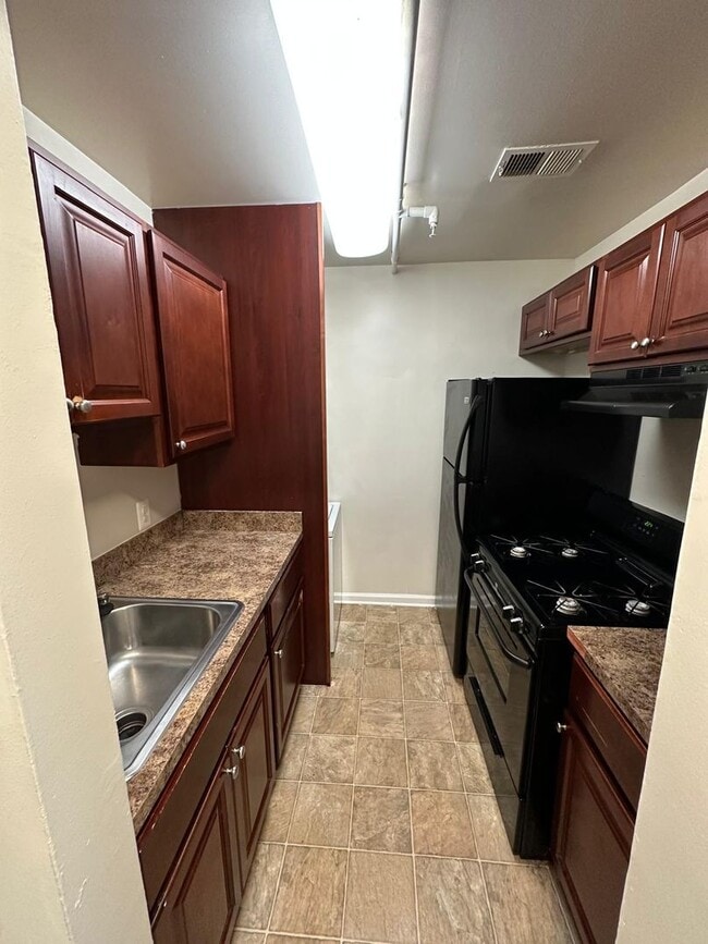 Building Photo - 1810 N Calvert St Unit 2