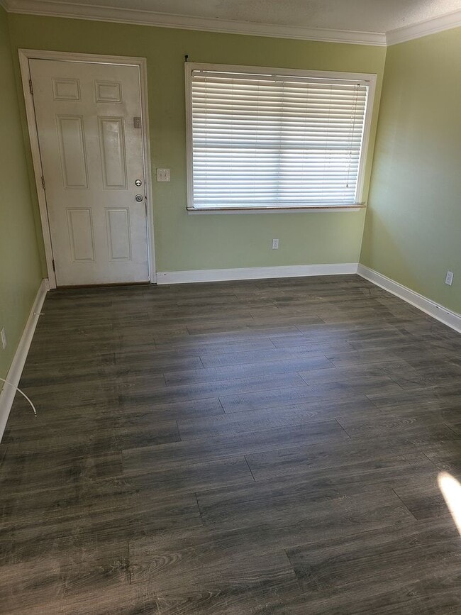 Photo - 1.1 New laminate flooring - looks amazing- Community Pool and Laundry facility