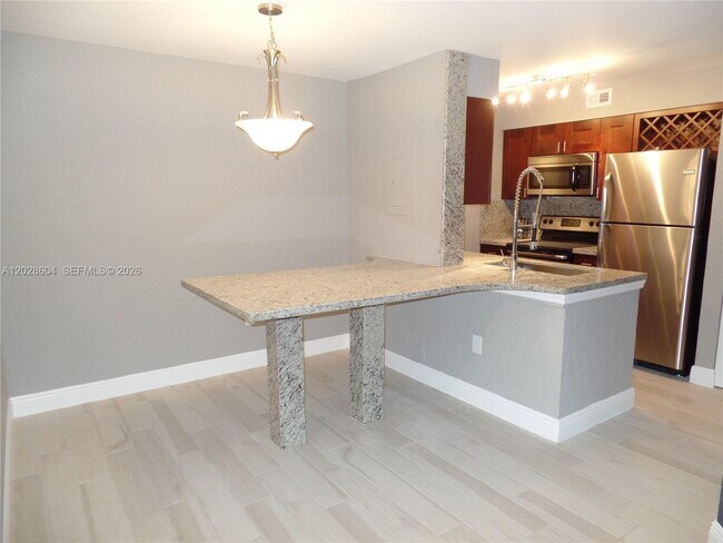 Building Photo - 2851 N Oakland Forest Dr Unit 111