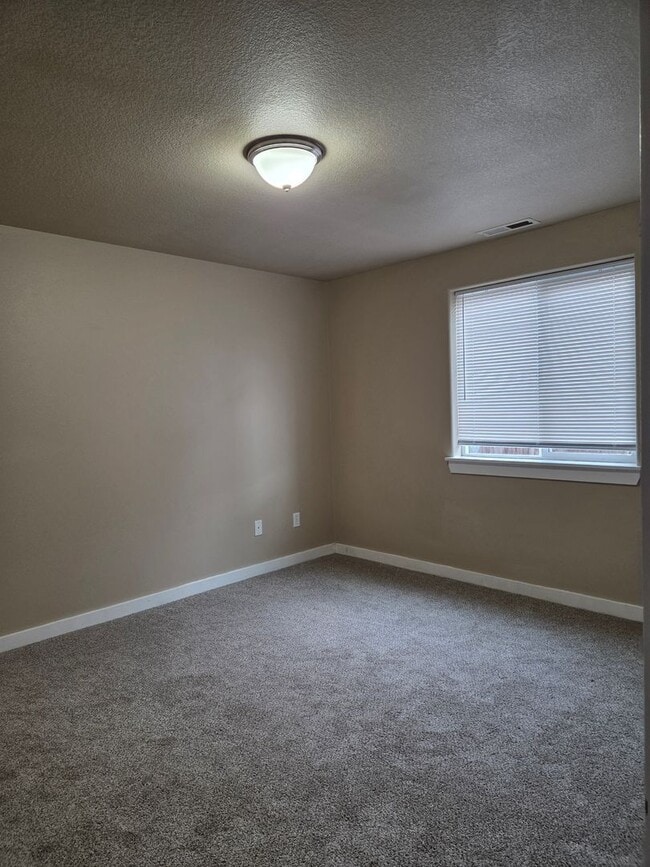 Photo - Beautiful Home! Large open living room! Double Car Garage! In private HOA neighborhood! Next to S...