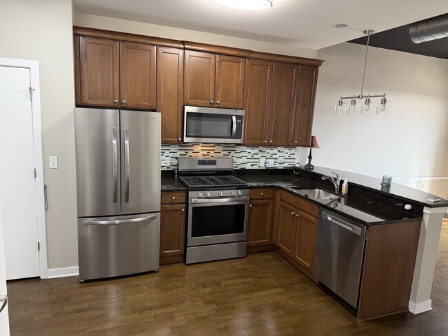Building Photo - 24 W Station St Unit 412