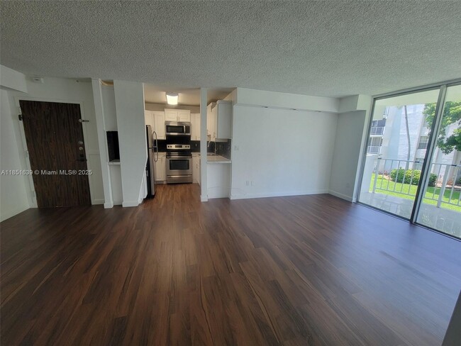 Building Photo - 494 NW 165th St Unit C-202 Rental
