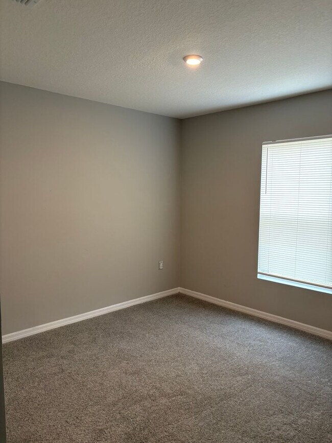 Photo - Beautiful 4-Bedroom Corner-Lot Home in Poinciana with 2-Car Garage