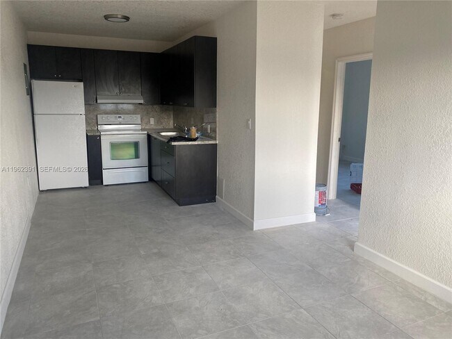 Building Photo - 10030 W Indigo St Unit 7