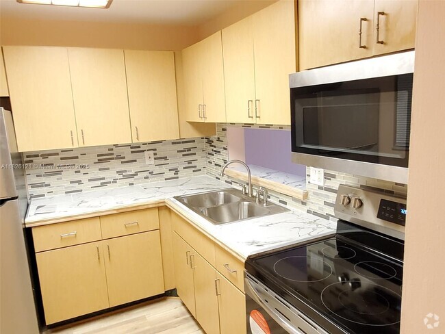 Building Photo - 8615 NW 8th St Unit 321 Rental