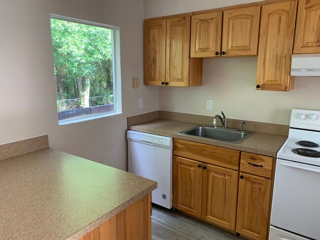 Kitchen with window - 609 SW 75th St Unit 201
