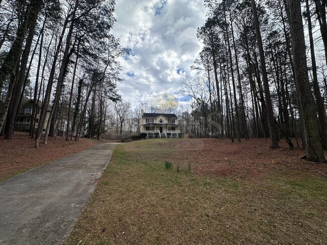 Photo - 4BR/3BA on Large Private Wooded Lot- Woodstock