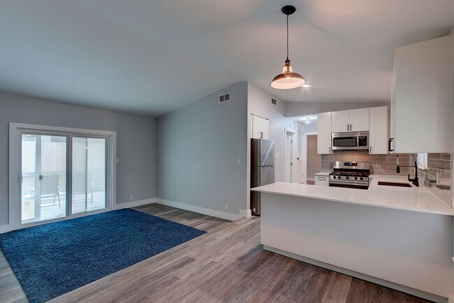 Photo - Modern Duplex Oasis with Stylish Upgrades, Open Design, and a Spacious Private Backyard!