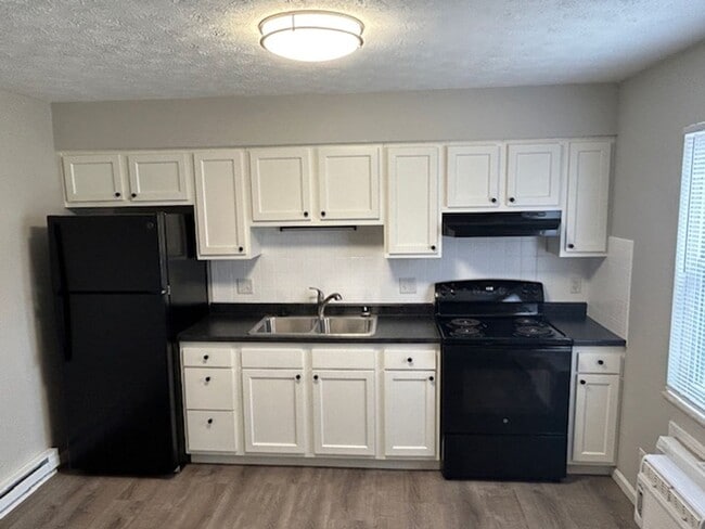Building Photo - Find Your Perfect Home at Bunker Hill Court Unit 1200-C Bunker Hill