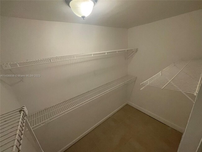 Building Photo - 2461 NW 56th Ave Unit 105 Rental