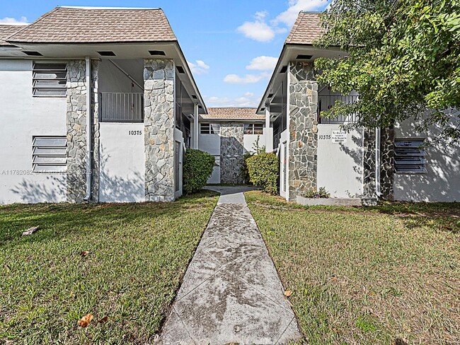 Building Photo - 10375 SW 40th St Unit X Rental