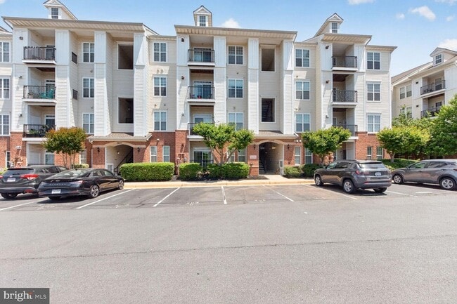 Building Photo - 21228 McFadden Square Unit 314