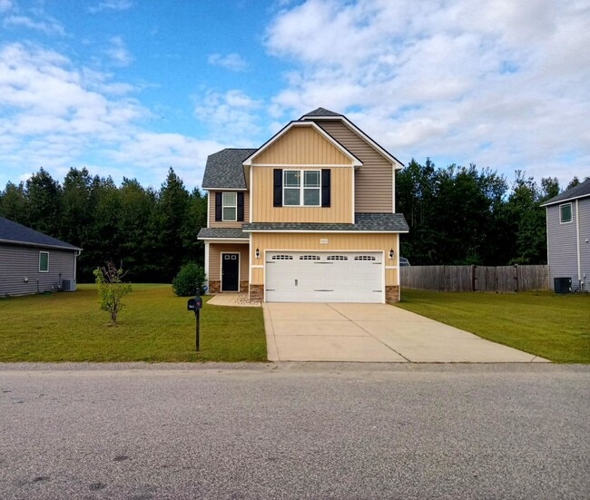 Building Photo - Stylish Two-Story in the dreamy Riverbrook...